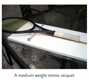 A medium weight tennis racquet